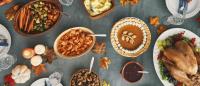 Traditional Holiday Dinner with Stuffed Turkey, Roasted Potatoes, Cranberry Sauce, Vegetables and Pumpkin Pie